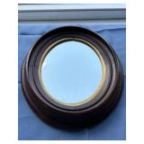 Pretty oval framed mirror approx 13"x11" - some