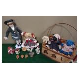 Basket of  porcelain dolls, teddy bear, owl,