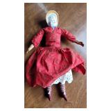 China Doll with red and white pinstripe legs