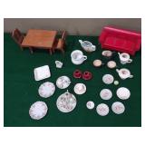 Dollhouse furniture and miniature tea sets, cup