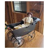 Really neat antique doll carriage with doll