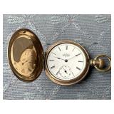 Elgin pocket watch - no glass on face - tested