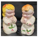 Praying salt and pepper children