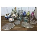 Basket of shells, planter, glass bottles, plates,