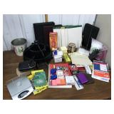Office supplies- Notebooks, desk organizer, GPS,