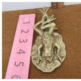 Brass frog clip hanging