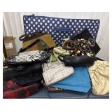 Large tote of miscellaneous purses and