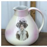 Porcelain pitcher- artist signed