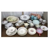 Plates, bowls, mugs, teapot, creamer, sugar etc