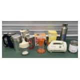 IBM water bottle, Yeti cup with lid, rice cooker,