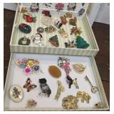 Mostly brooches - many christmas, enamel poodle,
