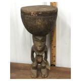 Carved wood tribal drum figure