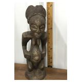 Carved wood tribal woman figure