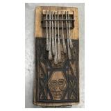 Lamellophone? Carved wood