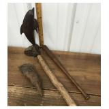 Carved wood dolphin, face, bat, stick