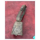 Cowbell on leather strap