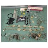 Costume jewelry bracelets belt brooches pins etc