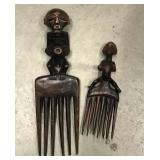 Man, woman carved wood tribal combs