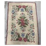 Vintage hooked rug approx 55ï¿½ x 37ï¿½. Floral