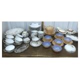 Plates, bowls, teapots, cups, saucers, covered