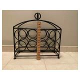 Very heavy metal wine holder.  ( holds at least 8