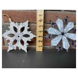 2 snowflakes.  1 blue and white pottery and 1