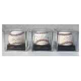 3 Autographed Official Major League Baseballs.