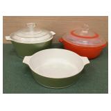2 green Corningware baking dishes that share a
