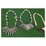 3 1980s lucite necklaces - black, blue, and Amber