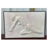 Hukle signed Female bas-relief sculpture