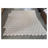 Antique handmade cotton crochet bedspread with a