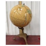 Cramï¿½s Imperial world globe with cast iron stand