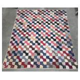 1800s bowtie quilt displayed at Museum of