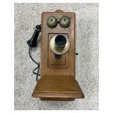 Antique oak wall phone.  Mouthpiece has the Utica
