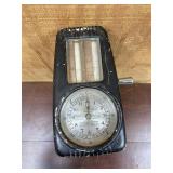 Measures yardage of fabric from an old store.