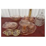 Mostly pink depression glass, covers dish and