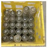 About 50+ insulators in double tall yellow milk