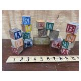 13 old wooden blocks and 3 wooden stamps