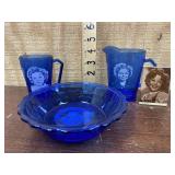 Blue glass cup, pitcher, bowl and magnet -