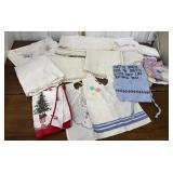 Assorted hankies, aprons, pillow cases, table