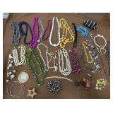 Assorted necklaces, bracelets, earrings, pin