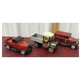 3 Tin Trucks