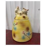Cookie jar kitten on a beehive