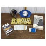 License plate, car mirror, clock, piston ring set