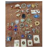 Costume jewelry brooches pins etc
