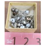 Small charms and dice