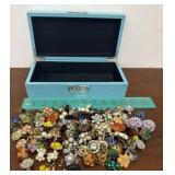 Jewelry box full of clip on earrings