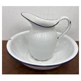 Blue and white enamel pitcher.