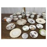 Assorted teacups, plates, sugar bowls etc