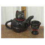 Red ware black cat teapot, eggcup